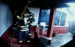 Menlo Park Fire Captain Seth Johnson had his helmet-cam rolling as his truck pulled up to a house fire in East Palo Alto Monday. Menlo Park Fire Captain Seth Johnson had his helmet-cam rolling as his truck pulled up to a house fire in East Palo Alto Monday.