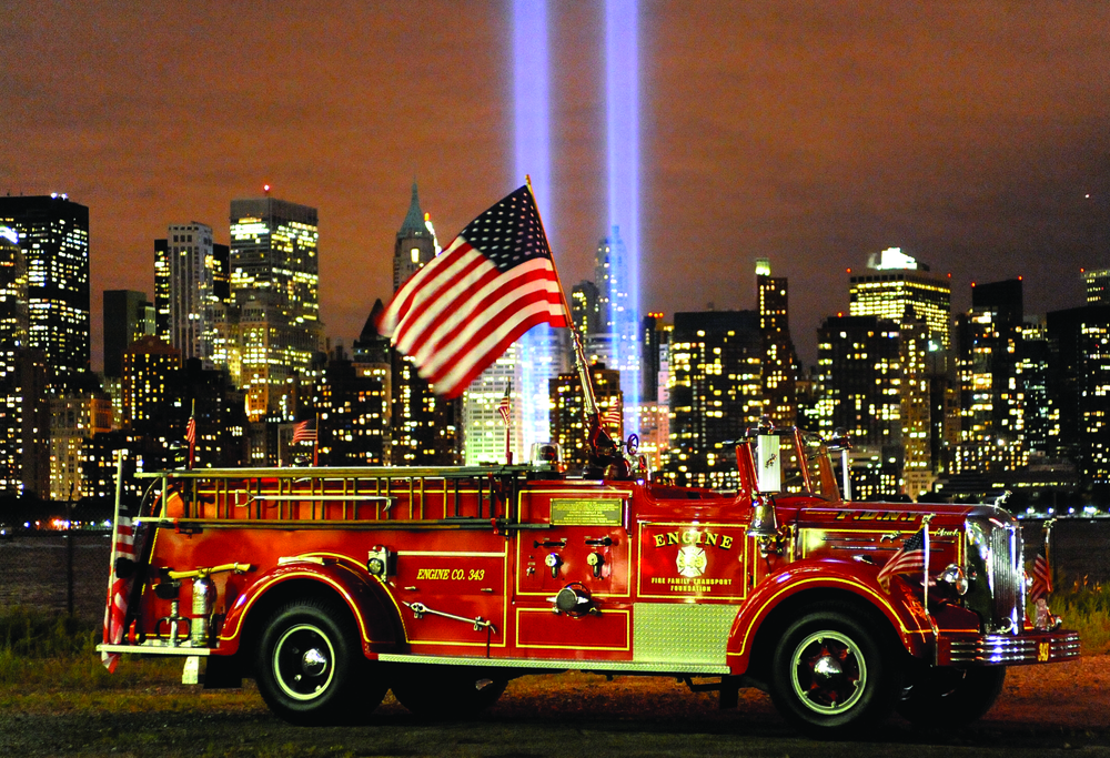 Engine 343 is pictured in front of the Tribute in Lights memorial at Ground Zero on September 10, 2010. Photo by Butch Moran