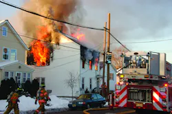 FAIR LAWN, NJ, FEB. 24, 2011 – A two-family home was destroyed in a two-alarm blaze, leaving four people homeless, including one person in a wheelchair. Units were dispatched shortly before 7 A.M. First-arriving police units confirmed that heavy smoke and fire was visible. All residents safely evacuated the building before the arrival of fire units, but flames had full possession of the second floor and attic. A second alarm was transmitted as exposure lines were put in operation. An interior attack was attempted, but heavy fire and the possibility of collapse made that untenable. Several exterior lines were put into operation as well as an elevated master stream in the rear. After about a one-hour battle, the flames were darkened down and held to the original fire building. The heat had melted the siding on both exposure buildings, but no other damage was reported. The cause is under investigation. FAIR LAWN, NJ, FEB. 24, 2011 – A two-family home was destroyed in a two-alarm blaze, leaving four people homeless, including one person in a wheelchair. Units were dispatched shortly before 7 A.M. First-arriving police units confirmed that heavy smoke and fire was visible. All residents safely evacuated the building before the arrival of fire units, but flames had full possession of the second floor and attic. A second alarm was transmitted as exposure lines were put in operation. An interior attack was attempted, but heavy fire and the possibility of collapse made that untenable. Several exterior lines were put into operation as well as an elevated master stream in the rear. After about a one-hour battle, the flames were darkened down and held to the original fire building. The heat had melted the siding on both exposure buildings, but no other damage was reported. The cause is under investigation.