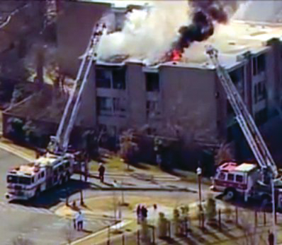 Prince George's firefighters rescued four people from a second-floor balcony with the use of a ground ladder.