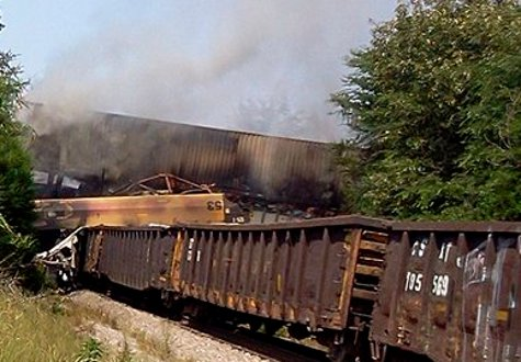 Freight trains smolder after two of them collided in Mineral Springs, N.C.