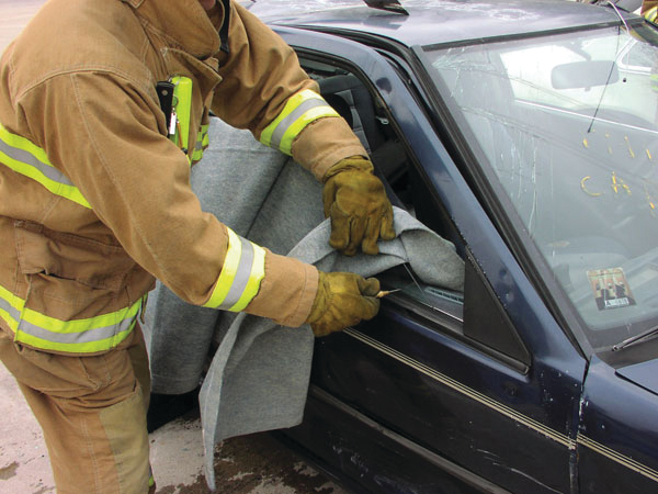 The solution is to attempt to cover or blanket unframed glass so as you break it, the cover or blanket will help contain the unwanted movement of the glass shards. For a side window on an SUV or minivan, hold a blanket or tarp against the window to somewhat contain the glass shard movement.