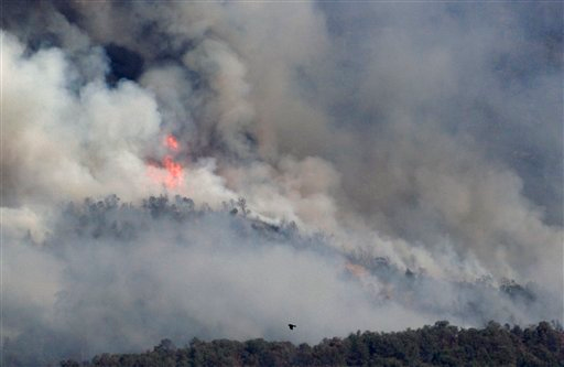 The Wallow Fire continues to burn on June 13.