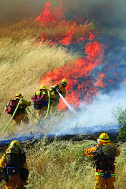 MONTEREY COUNTY, CA, MAY 30, 2011 –The U.S. Forest Service, three air tankers, three helicopters, 10 engines, a dozer and several hand crews attacked a fire that involved 500 acres of grass and brush near homes outside San Ardo. First-arriving units found a downed power line had spread flames into the grass, with 30 acres of fire being pushed by strong winds. Before the afternoon was over, 500 acres were consumed and the incident commander reported the potential for 5,000 acres if the strong winds did not cease. By 6:45 P.M., the 50-mph winds did subside, letting firefighting resources corral the fire. MONTEREY COUNTY, CA, MAY 30, 2011 –The U.S. Forest Service, three air tankers, three helicopters, 10 engines, a dozer and several hand crews attacked a fire that involved 500 acres of grass and brush near homes outside San Ardo. First-arriving units found a downed power line had spread flames into the grass, with 30 acres of fire being pushed by strong winds. Before the afternoon was over, 500 acres were consumed and the incident commander reported the potential for 5,000 acres if the strong winds did not cease. By 6:45 P.M., the 50-mph winds did subside, letting firefighting resources corral the fire.