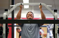 Philadelphia Eagles top draft pick Danny Watkins does pull-ups as he works-out with other Eagles players. Philadelphia Eagles top draft pick Danny Watkins does pull-ups as he works-out with other Eagles players.