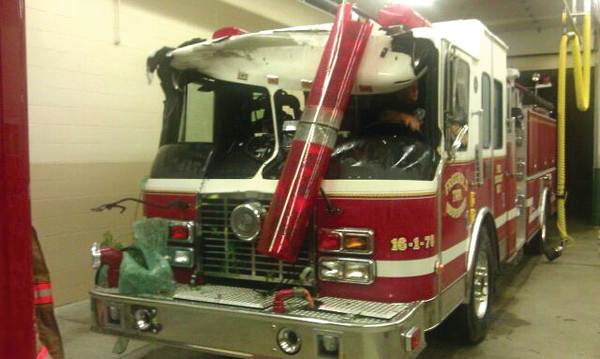 A tree crashed down on a Freehold Township fire truck responding to a call on Jackson Mills Road Sunday morning.