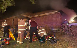 Fort Worth firefighters work a man and woman that were rescued from their home at 8101 Arbor by firefighters and police around 330am Tuesday. The woman was taken to Parkland with smoke inhalation and burns while the man was taken by ground to Harris Hospital. Their daughter was also taken to the hospital with respiratory issues. The cause was under investigation according to PIO Captain Tom Crow. Fort Worth firefighters work a man and woman that were rescued from their home at 8101 Arbor by firefighters and police around 330am Tuesday. The woman was taken to Parkland with smoke inhalation and burns while the man was taken by ground to Harris Hospital. Their daughter was also taken to the hospital with respiratory issues. The cause was under investigation according to PIO Captain Tom Crow.