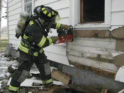 Figure 1. Enlarging windows into doorways is a simple skill that rapid intervention team members must be able to perform. Figure 1. Enlarging windows into doorways is a simple skill that rapid intervention team members must be able to perform.