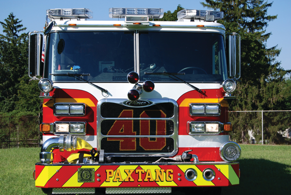 The steel reinforced front bumper provides space for a 5-inch front suction, trash line and two hose wells. Note the chevron stripping on the front face of the bumper.