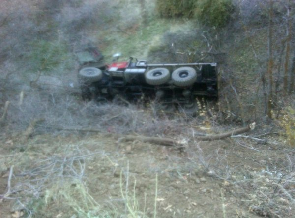 A Farmington fire truck lies at bottom of embankment where it overturned Wednesday night.