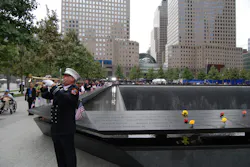 An FDNY firefighter is seen playing the trumpet next to the World Trade Center Memorial on Sept. 11, 2011. An FDNY firefighter is seen playing the trumpet next to the World Trade Center Memorial on Sept. 11, 2011.