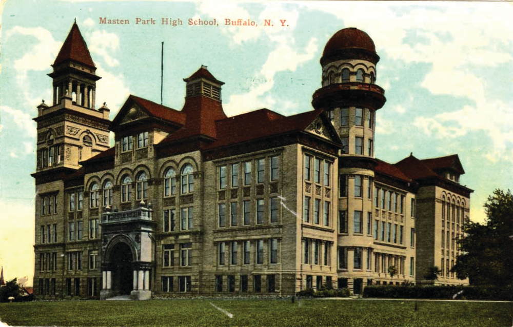 BUFFALO, NY: MARCH 27, 1912 &ndash; Built on Buffalo&rsquo;s highest hill, the massive Masten Park High School could be seen from nearly every part of the city and was known as &ldquo;the school on the hill&rdquo; for its white facade and lofty towers. Around 10 A.M., a fire broke out in one of the towers and the fire gong sounded. The 1,200-strong student body believed it to be a fire drill and marched out onto the cold, slushy grounds only to be surprised to see smoke pouring from the top floors of the castle-like building. As the fire department responded, teachers and students dashed back inside to save musical instruments and a collection of treasured American flags. Further salvage efforts were stopped after a section of the roof collapsed. The school was a total loss, although the library was unharmed and all the books and materials were recovered.