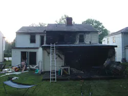 Two family members escaped the fire by climbing out windows onto the flat roof over the rear family room and then descending a ladder. Two family members escaped the fire by climbing out windows onto the flat roof over the rear family room and then descending a ladder.