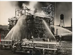 A five-alarm fire broke out in a 60-foot-high coal tipple containing 300 tons of coal at the Pennsylvania Railroad's Orangeville Yard in Baltimore, MD, on Feb. 23, 1936. A five-alarm fire broke out in a 60-foot-high coal tipple containing 300 tons of coal at the Pennsylvania Railroad's Orangeville Yard in Baltimore, MD, on Feb. 23, 1936.
