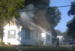 Four firefighters suffered from smoke inhalation and heat exhaustion following a blaze at a home of one of their own in Taylor on May 17. Four firefighters suffered from smoke inhalation and heat exhaustion following a blaze at a home of one of their own in Taylor on May 17.