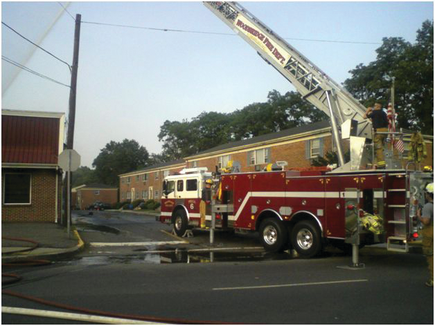 Photo 1: The front of the incident belongs to the truck company; in the event of potential collapse, flanking the building is a better strategy.