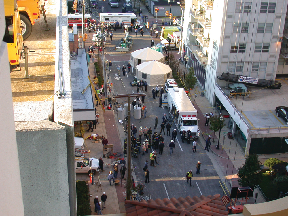 Photo 1. Getting urban search and rescue (USAR) resources on scene can take time. A considerable amount of work must be done before rescue crews start working the pile.