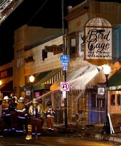 Firefighters put out a fire at the Bird Cage Saloon on historic Whiskey Row in Prescott, Ariz. on May 8. Firefighters put out a fire at the Bird Cage Saloon on historic Whiskey Row in Prescott, Ariz. on May 8.