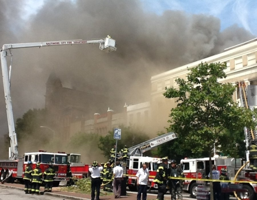 Baltimore firefighters battled a five-alarm blaze at a vacant warehouse in Fells Point Monday afternoon.
