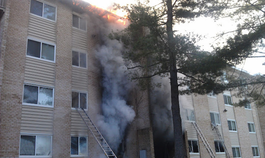 Prince George's County firefighters rescued a family of four from a three-alarm blaze at an apartment complex in Suitland on June 6.