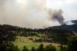 The High Park fire burns on Stove Prairie Road and Highway 14 in Poudre Canyon, as seen from Glacier View Meadows, west of Fort Collins, Colo. on June 12. The High Park fire burns on Stove Prairie Road and Highway 14 in Poudre Canyon, as seen from Glacier View Meadows, west of Fort Collins, Colo. on June 12.