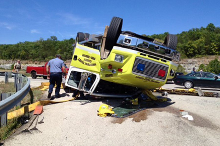 A Western Taney County water tanker rolled over as the driver attempted to make a left hand turn while responding to a brush fire.