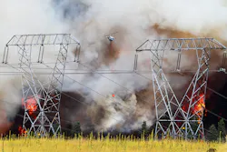 A firefighting helicopter, operated by the Washington State Department of Natural Resources, works to supress flames from the Taylor Bridge Fire east of Cle Elum, Wash. on Aug. 13. A firefighting helicopter, operated by the Washington State Department of Natural Resources, works to supress flames from the Taylor Bridge Fire east of Cle Elum, Wash. on Aug. 13.