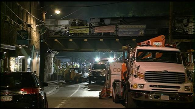 An overnight train derailment in Ellicott City has taken the lives of two bystanders and has made a mess of the town's historic downtown area.