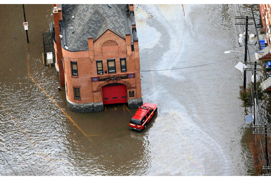 A firehouse is surrounded by floodwaters in the wake of superstorm Sandy in Hoboken, N.J. on Oct. 30.