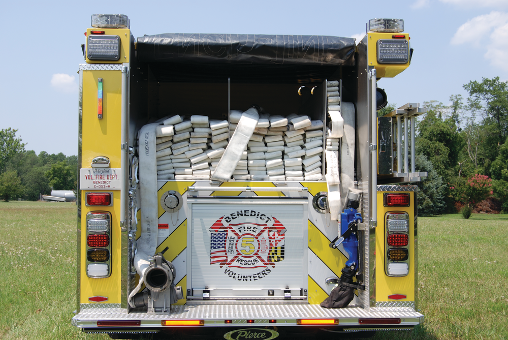 The rear hose bed carries split beds of 3-inch hose, together with a preconnected 2.5-inch attack line and a leader line equipped with a TFT Blitz Fire portable master stream.