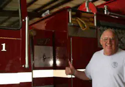 The late Jack Peltier, a former assistant chief with Marlbourgh (Mass.) Fire Department, poses with the fire engine he helped get donated to the Johnson County Rural Fire District No. 1, in Clarksville, Ark. The late Jack Peltier, a former assistant chief with Marlbourgh (Mass.) Fire Department, poses with the fire engine he helped get donated to the Johnson County Rural Fire District No. 1, in Clarksville, Ark.
