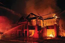 Firefighters in New Orleans, LA, battle a four-alarm fire that destroyed a pair of vacant two-story, wood-constructed dwellings. One of the homes totally collapsed. Firefighters in New Orleans, LA, battle a four-alarm fire that destroyed a pair of vacant two-story, wood-constructed dwellings. One of the homes totally collapsed.