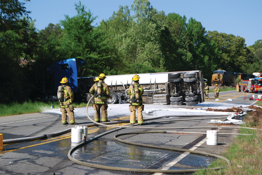 Gwinnett County Fire Department Hazardous Materials Response Team responded to an overturned tanker that spilled 2,000 gallons of gasoline into a creek.