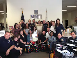 Jessica and her mom pose with the staff from the San Bernardino County’s Office of the Fire Marshal Jessica and her mom pose with the staff from the San Bernardino County’s Office of the Fire Marshal