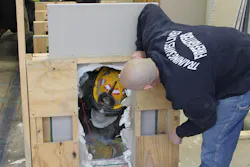 During the rapid intervention training program, Jim McCormack and his team showed the importance of teamwork within the group. During the rapid intervention training program, Jim McCormack and his team showed the importance of teamwork within the group.