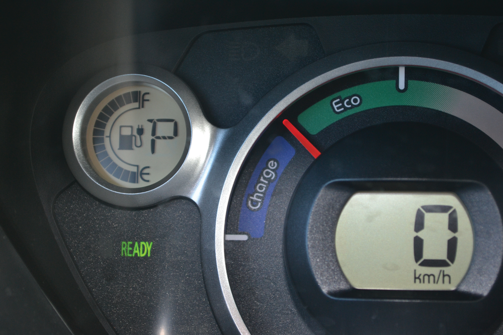 The instrument panel of this i-MiEV electric vehicle indicates that it is in the 'ready' mode, is powered up, and can be operated and driven. Once the ignition is turned off, the ready light will go out, the red needle will drop, and the speedometer and battery-level displays will go out.