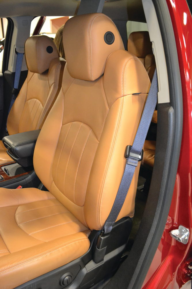 The driver's front seat of this GM vehicle has two seat-mounted airbags. On the outboard, or left side of the seat, one airbag 'ID' is visible along the upholstery seam. This airbag will deploy when this side of the vehicle receives sufficient impact.