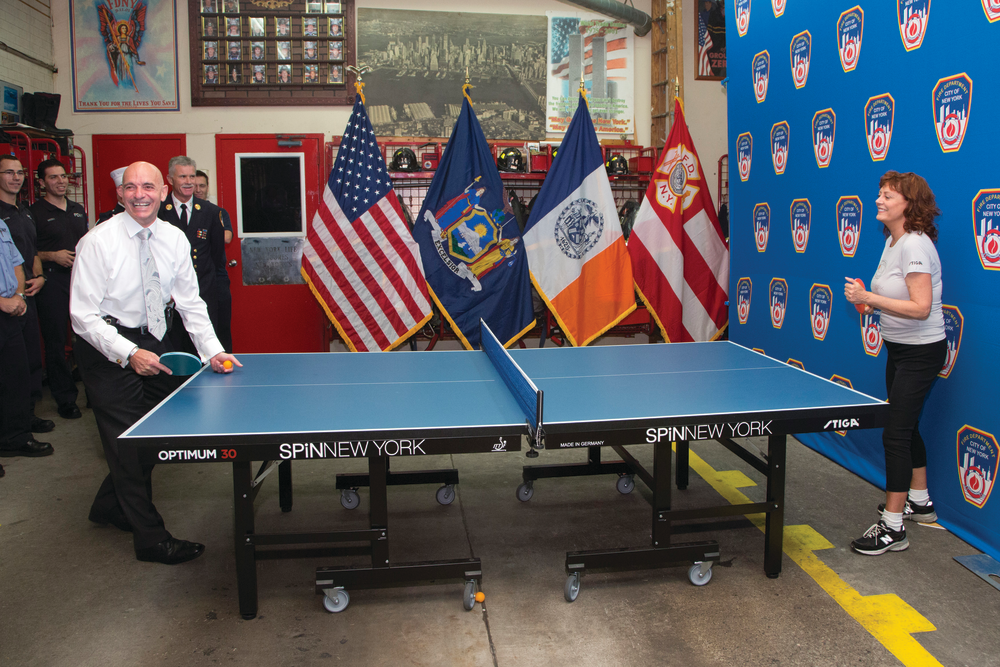 Oscar-winning actress and co-owner of SPiN New York Susan Sarandon competed against FDNY Commissioner Salvatore J. Cassano at the quarters of Engine 14 in Manhattan on August 21, 2013. SPiN New York and STIGA will donate 10 table tennis tables to FDNY firehouses and EMS stations throughout New York City.
