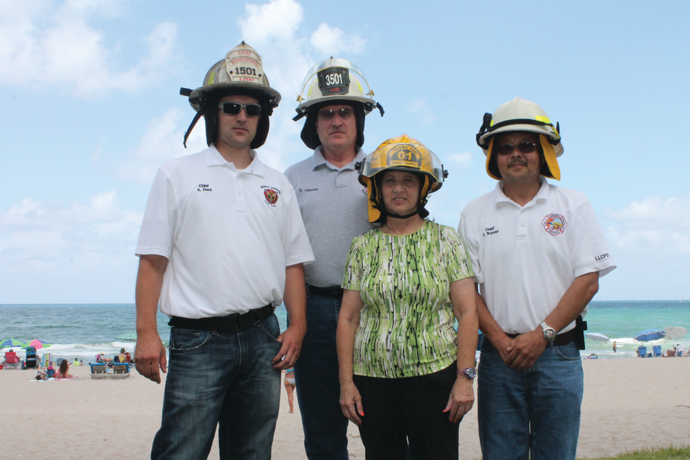 Carol Landau with (from left) Chiefs Dent, Altman and Truman