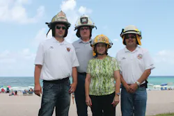 Carol Landau with (from left) Chiefs Dent, Altman and Truman Carol Landau with (from left) Chiefs Dent, Altman and Truman