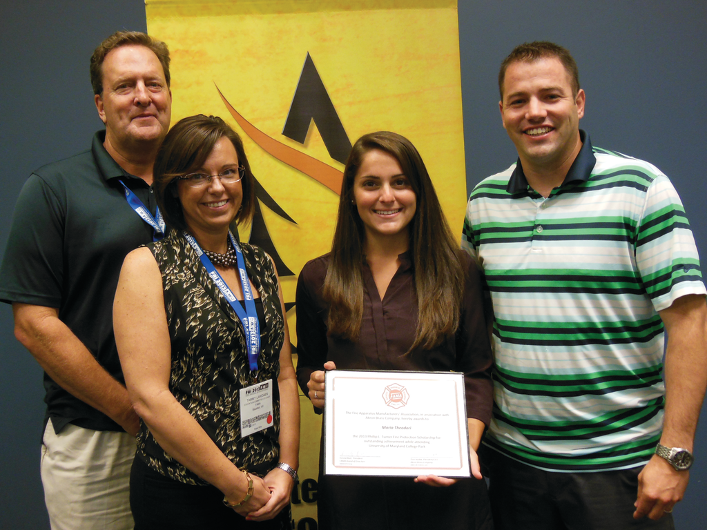 The Fire Apparatus Manufacturers' Association (FAMA) has awarded its 2013 Phillip L. Turner Fire Protection Scholarship to University of Maryland student Maria Theodori, holding certificate. Theodori, a senior majoring in fire protection engineering, received a $5,000 scholarship in recognition of her academic achievement and commitment to the fire service. In addition to her academics, Theodori is president of the university's Society of Fire Protection Engineers Student Chapter. Last summer, she interned in Greece with the Forest Research Institute of Athens to research wildfires and how to decrease home vulnerability on the wildland/urban interface. The award is given annually by FAMA and has been sponsored since 2009 by FAMA member Akron Brass Co. With Theodori are Akron Brass representatives Tim Van Fleet, left, and Dave Durstine, accompanied by Tammy Laridaen of the FAMA Education Committee.