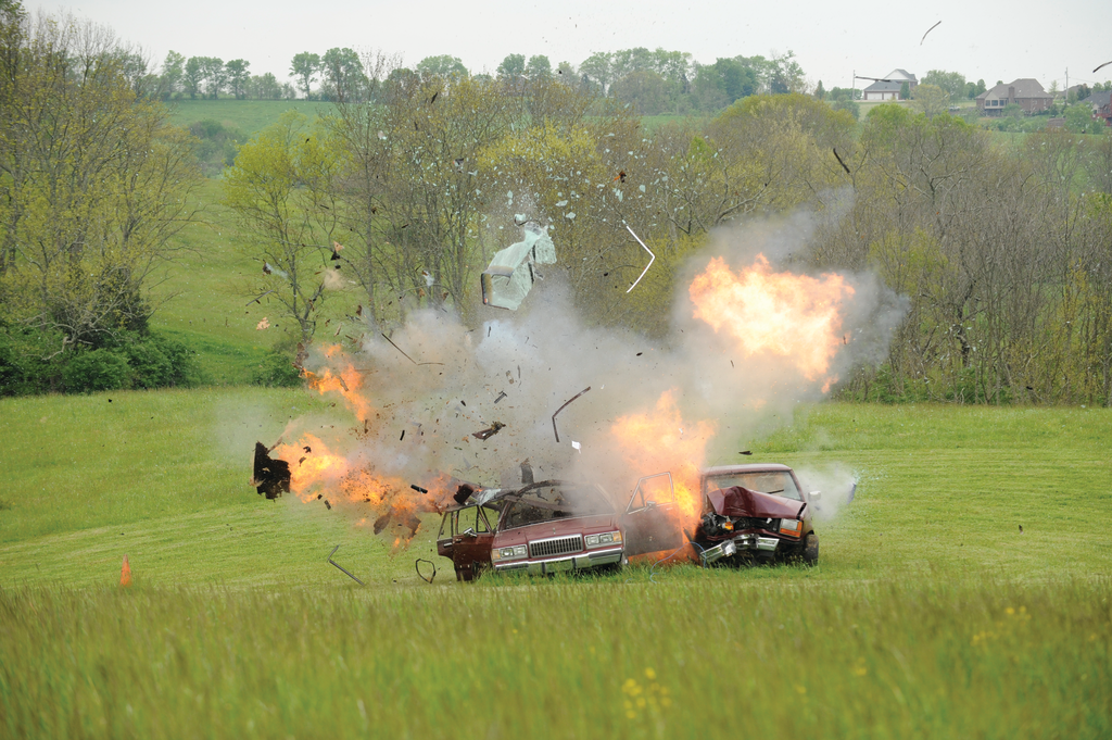 A training shot scatters debris from two vehicles for a post-explosion investigation course at Eastern Kentucky University's Fire, Arson and Explosion Investigation degree program.