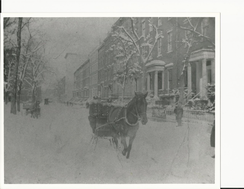 FDNY battalion chief and driver use a sleigh to respond after a snow storm.