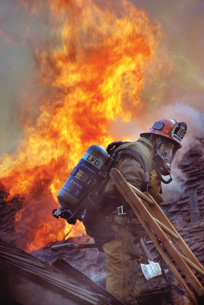 OCT. 30: ENCINO, CA &ndash; Over 100 Los Angeles firefighters battled a huge blaze raging at an Encino home that injured two captains and two firefighters. The home's location was a challenge as firefighters faced curvy narrow roads and had to hike equipment a 1/4-mile uphill to the structure. A long and relentless attack led to a fully extinguished blaze in two hours and 20 minutes. Two pet dogs were found deceased.