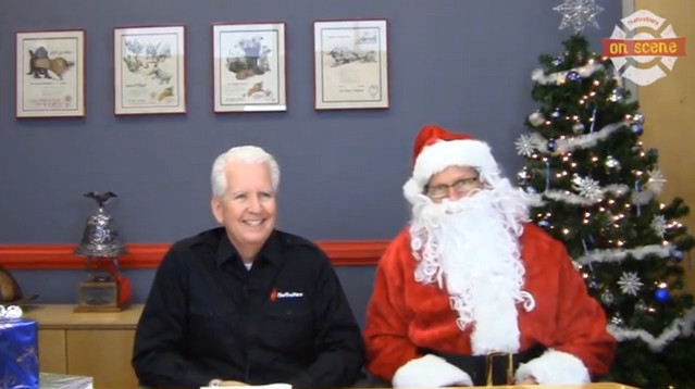 Santa Setting Stockings On Fire