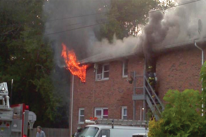 Photo 4: It's important that crews choose the right length and size of hose to make it to the involved unit.