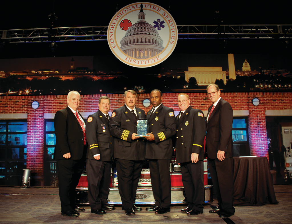 CFSI/MedicAlert Foundation Excellence in Fire Service-Based EMS Awards were presented to three organizations at the Congressional Fire Services Institute (CFSI) 26th National Fire and Emergency Services Dinner and Seminars Program. From left: Chris Neal of the CFSI Board of Directors; Memphis, TN, Fire Department Lieutenant James Strickland, Deputy Fire Chief and Firehouse&circledR; Contributing Editor Gary Ludwig, Fire Chief Alvin Benson and Lieutenant James Logan; and Andrew Wigglesworth, CEO and president of the MedicAlert Foundation. Also honored with EMS awards were the Howard County, MD, Department of Fire & Rescue Services and the Cullman County, AL, Association of Volunteer Fire Departments.