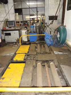 The machine is made up of several components. There is a desk with a computer screen and a printer. To the immediate right of the desk is a computer that captures information. To the right of the computer’s brain is a blue cylindrical machine; that is the hydraulic pump that powers the rollers and the yellow panels that act as shakers. The machine is made up of several components. There is a desk with a computer screen and a printer. To the immediate right of the desk is a computer that captures information. To the right of the computer’s brain is a blue cylindrical machine; that is the hydraulic pump that powers the rollers and the yellow panels that act as shakers.