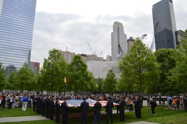 The National 9/11 flag is shown prior to placement.
