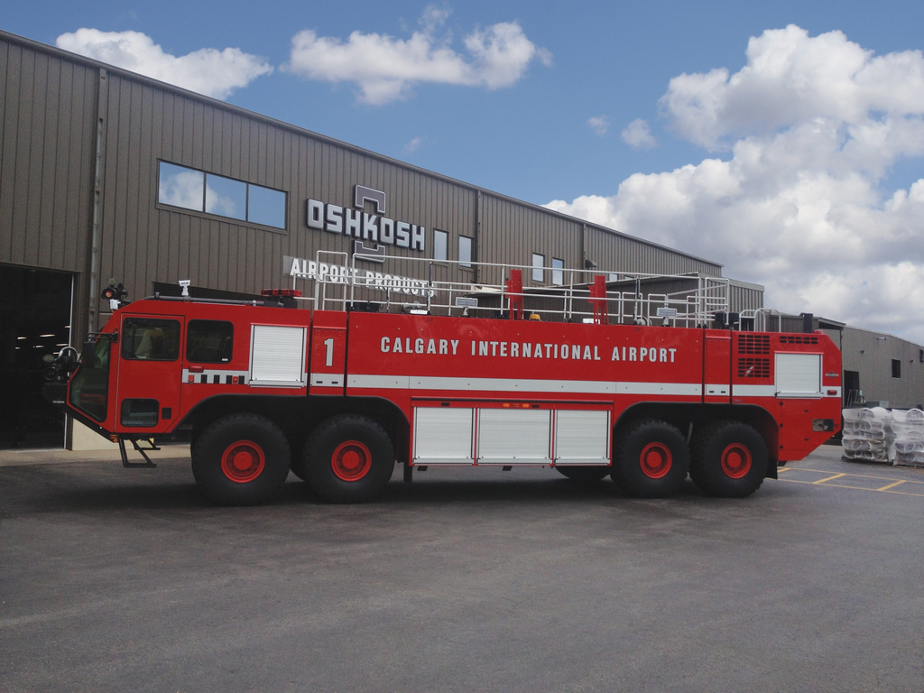Photo caption: Oshkosh Airport Products Group has placed two Oshkosh&circledR; Striker&circledR; 8 x 8 aircraft rescue and fire fighting (ARFF) vehicles into service at Calgary International Airport (YYC) in Calgary, Alberta, Canada. The pair of Oshkosh Striker vehicles will support the airport&rsquo;s new 14,000-foot (4.2 km) long runway set to open in mid June.